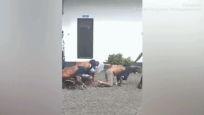 印尼狱警拖行毒贩视频曝光 监狱长已被停职